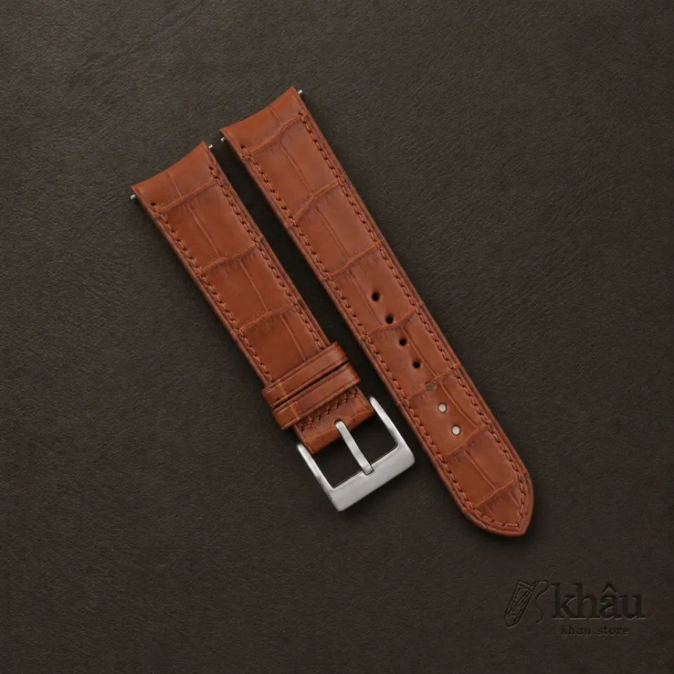 Curved End Cognac Alligator Leather Watch Strap — front view